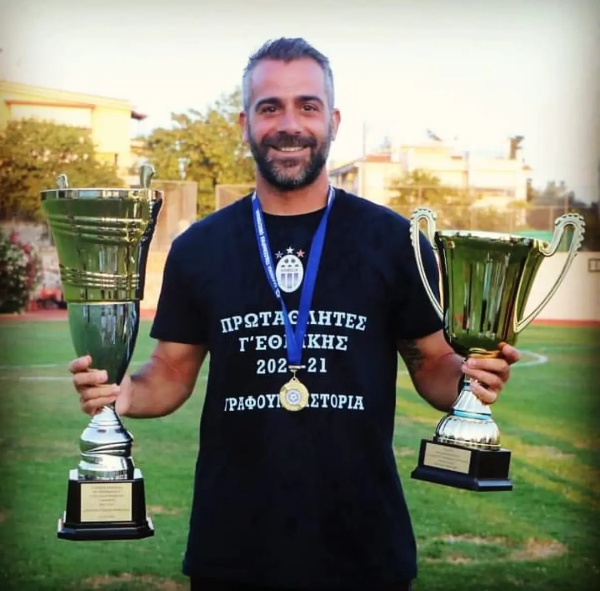 Panagiotis Pomonis with the 2020–21 Kifisia championship trophies