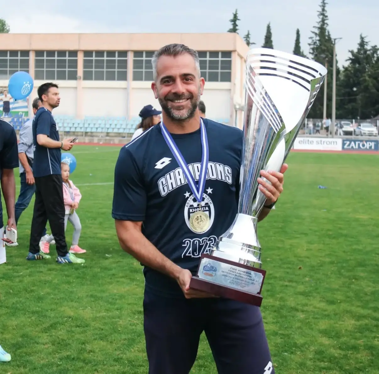 Panagiotis Pomonis with the 2022–23 Kifisia Super League 2 trophy